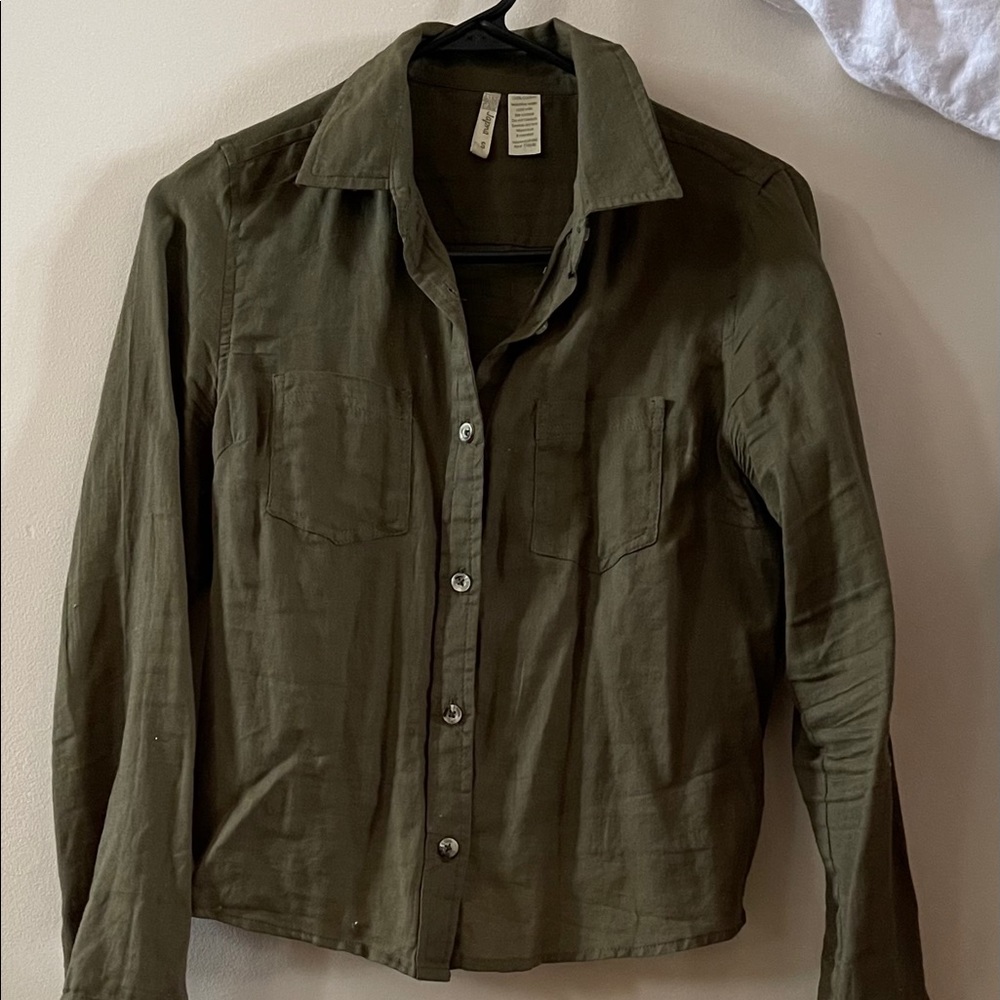 Green button up shirt